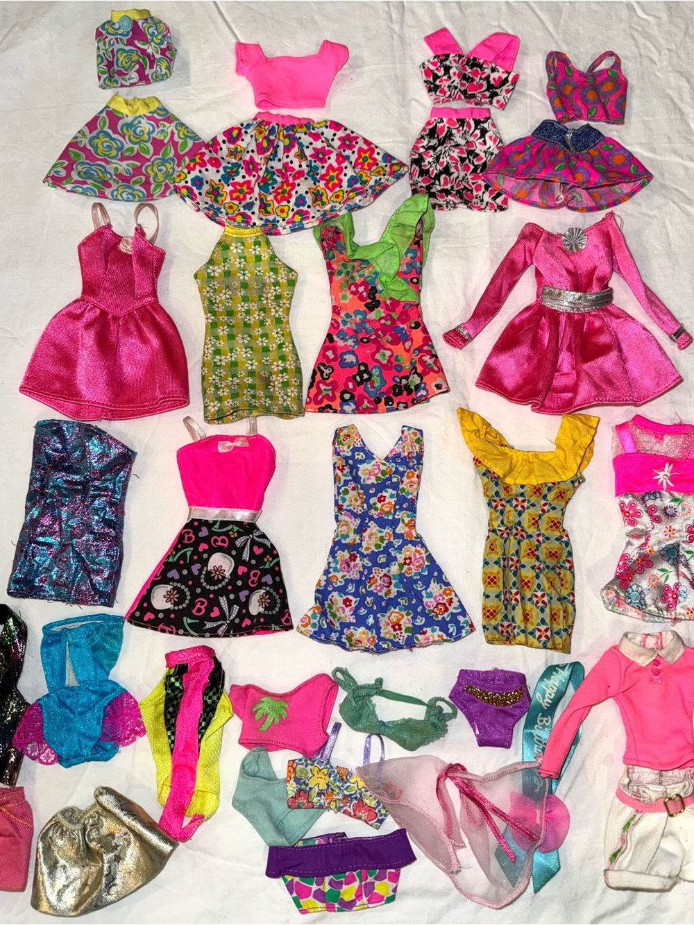 Vintage Barbie doll clothes, lot dresses and more